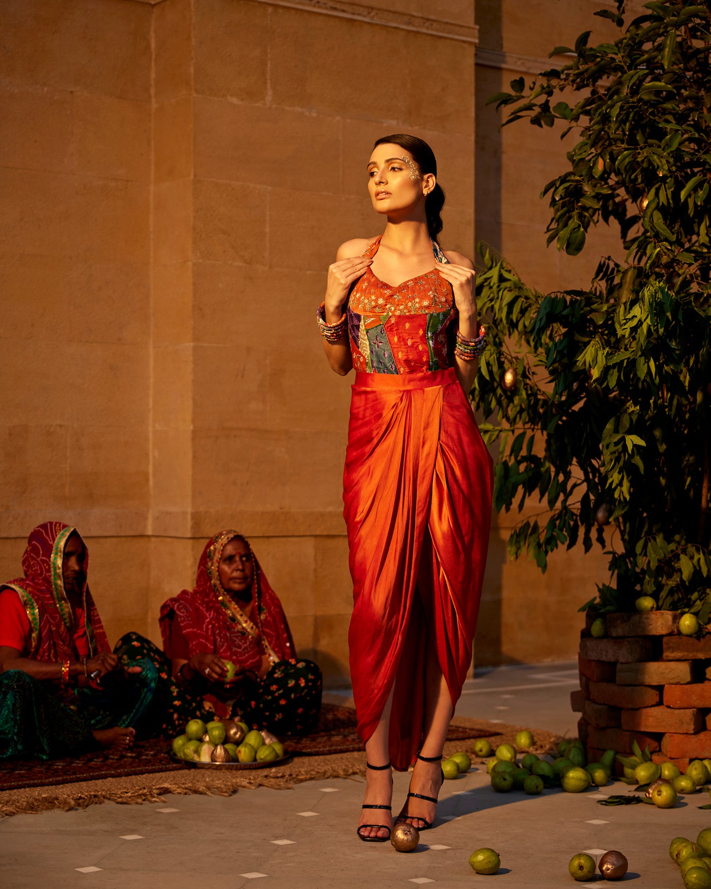 Burnt orange satin drape skirt paired with a hand-block highlighting corset for women