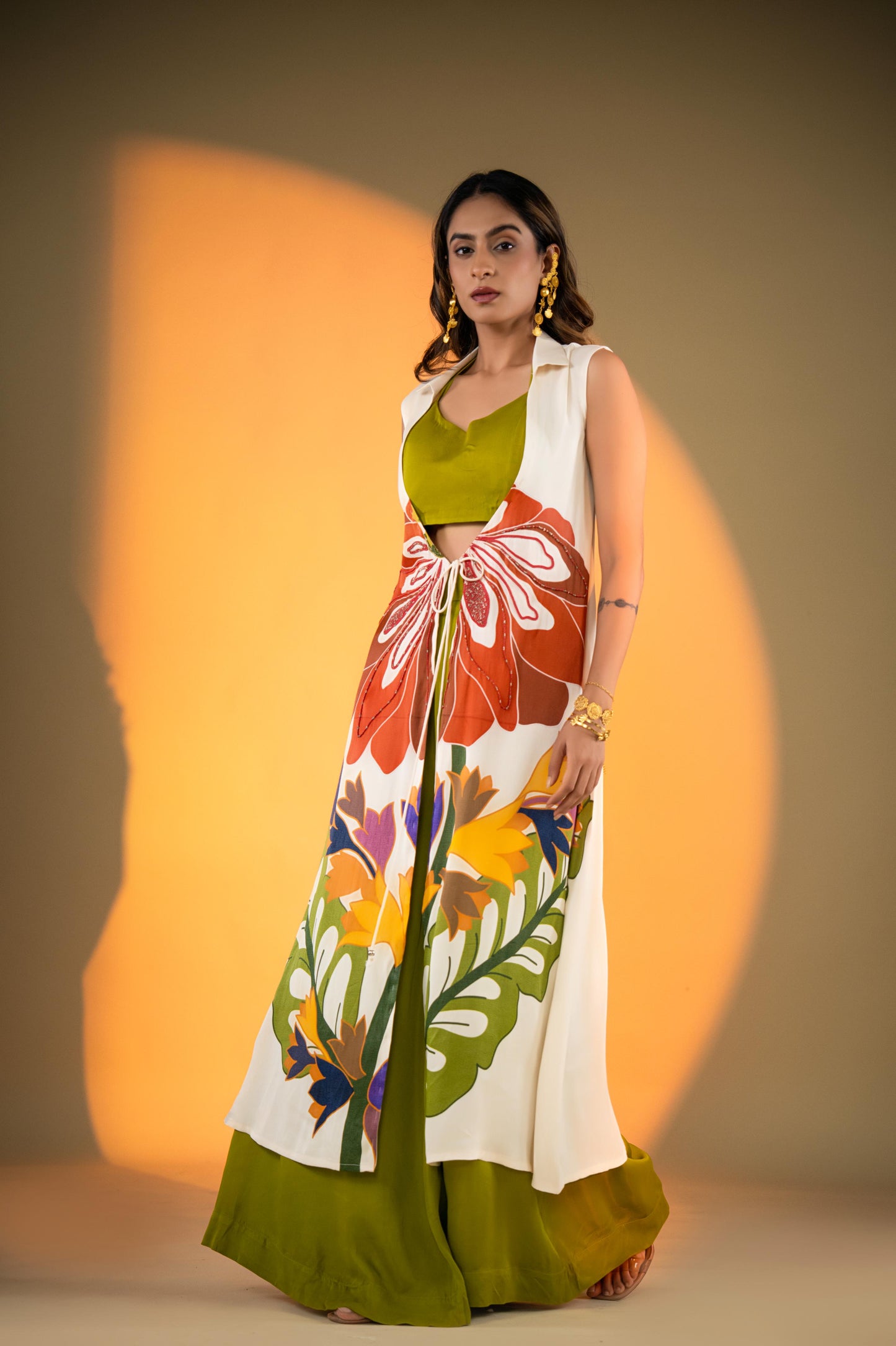 Off-White Sleeveless Kurta Set with Floral Embroidery & Green Flared Pants