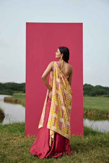 Yellow lehenga set paired with drape dupatta for women