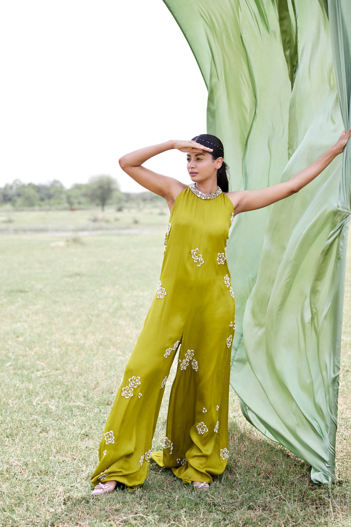 Satin green jumpsuit highlighted with pear embroidery for women