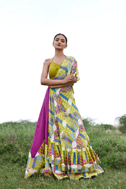 Magenta lehenga set with a patched hand-block border and a side tie on highlighted cape for women