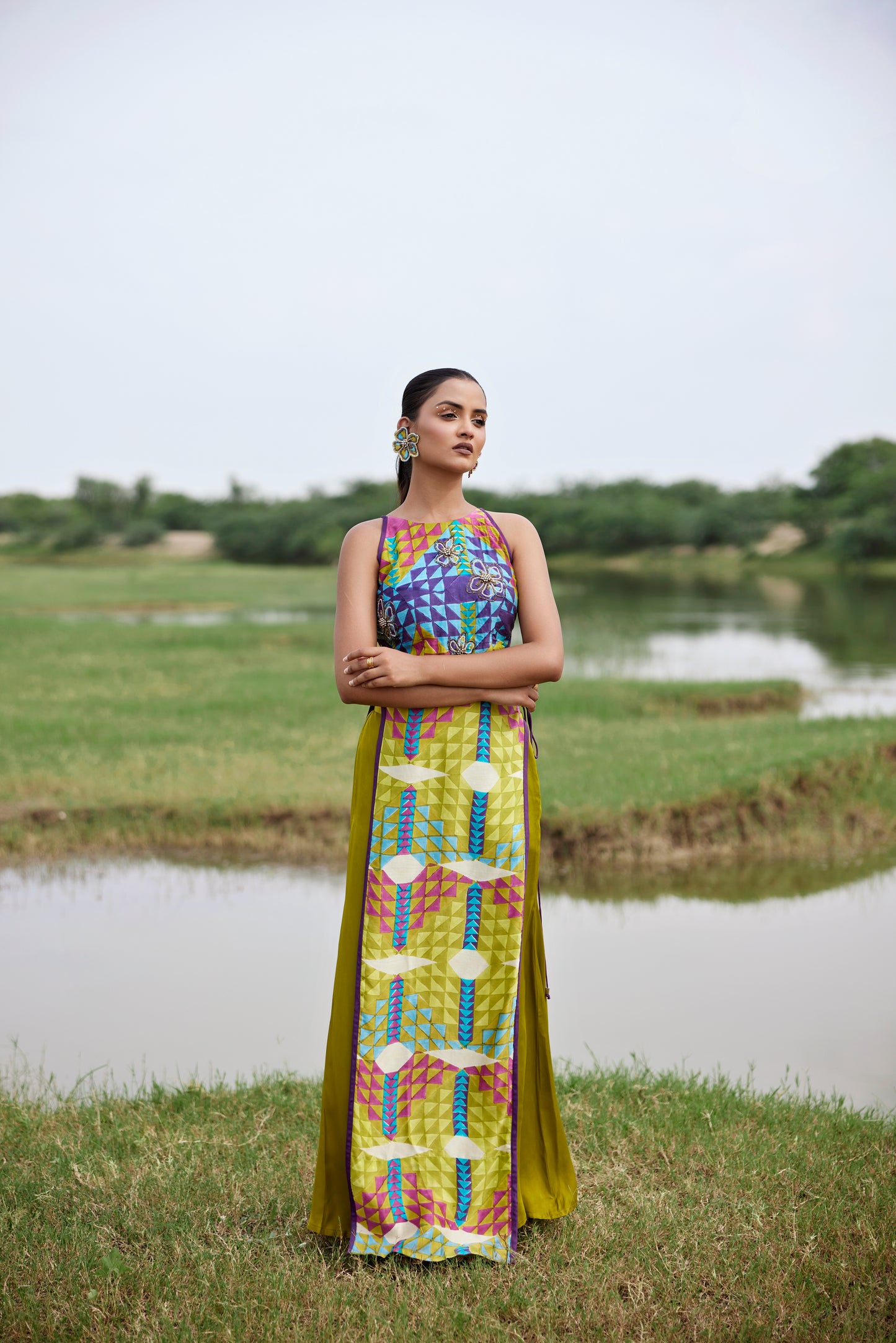 Green long top with side tie on paired with pants for women