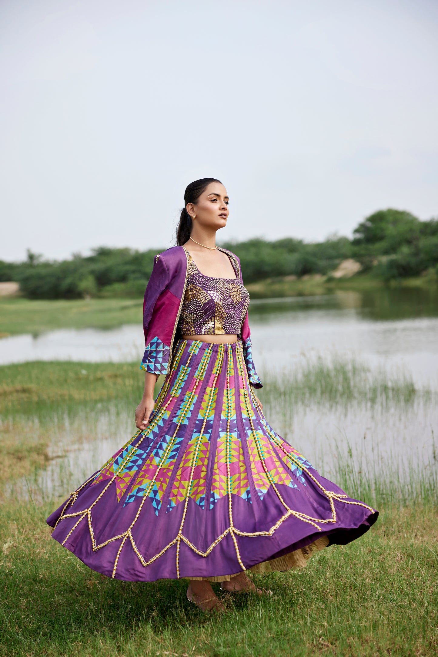 Purple heavily embroidered patched lehenga set with intricate blouse and jacket for women