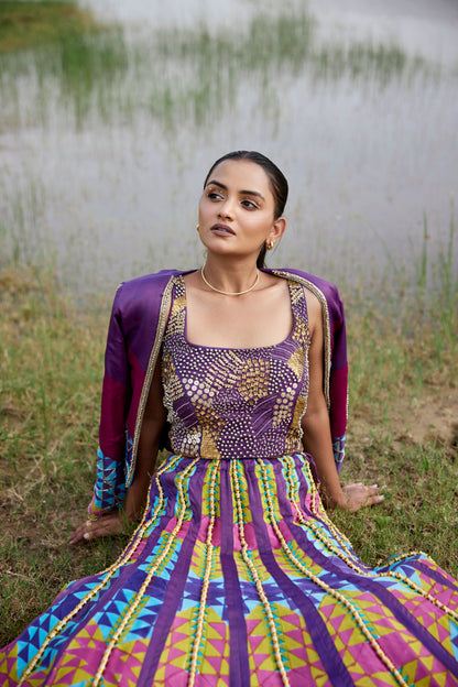 Purple heavily embroidered patched lehenga set with intricate blouse and jacket for women