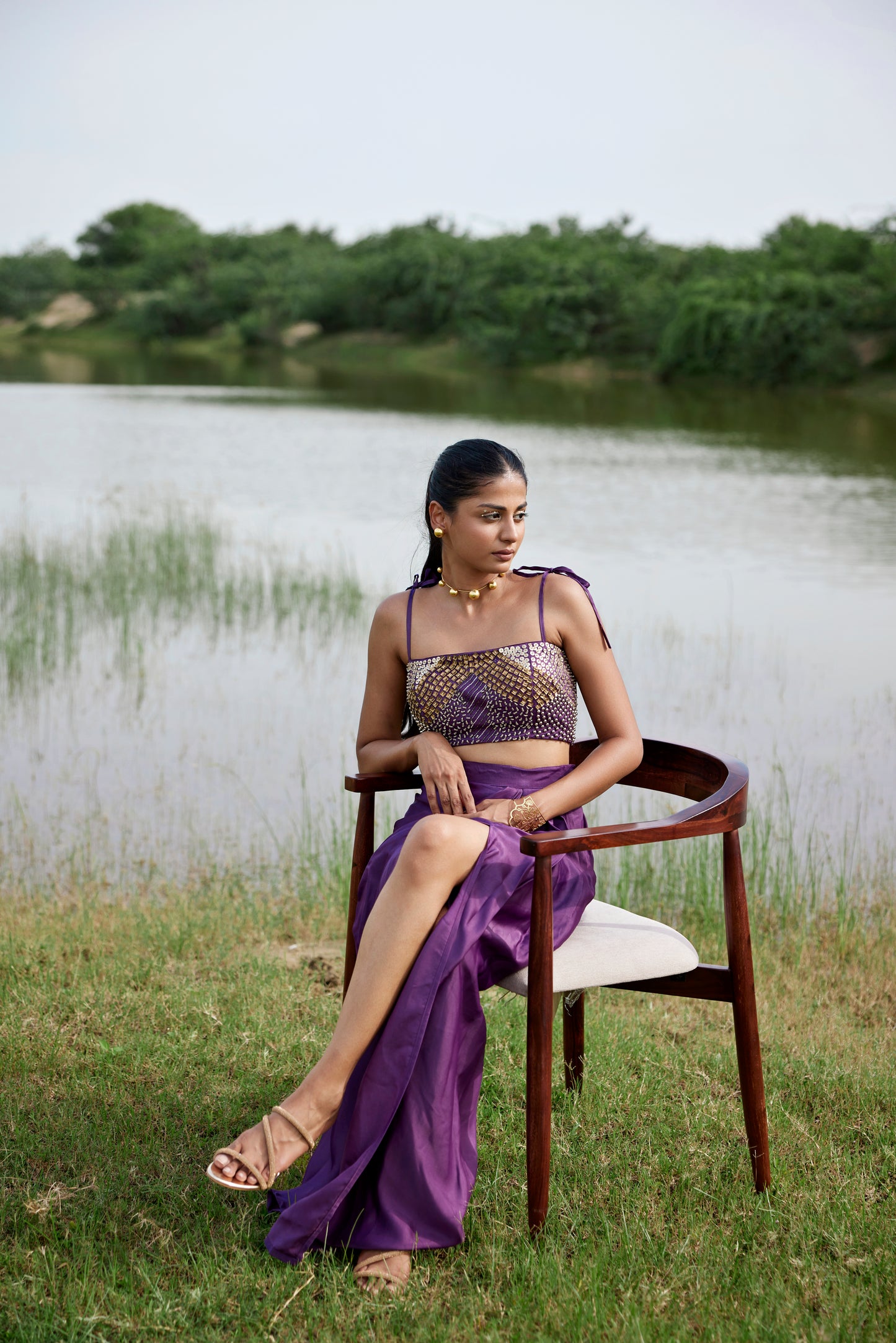 Purple drape skirt paired with heavily embroidered blouse for women