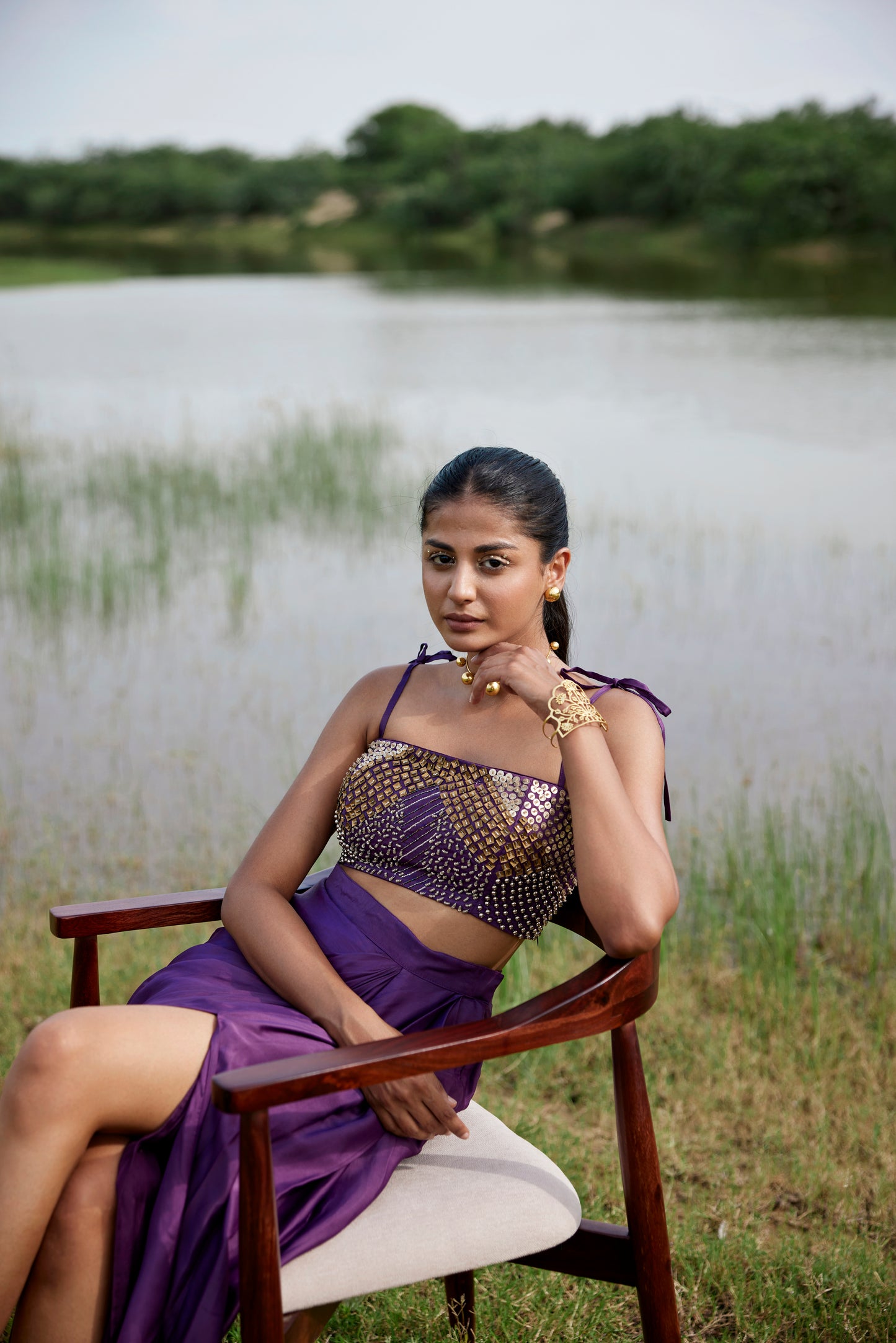 Purple drape skirt paired with heavily embroidered blouse for women