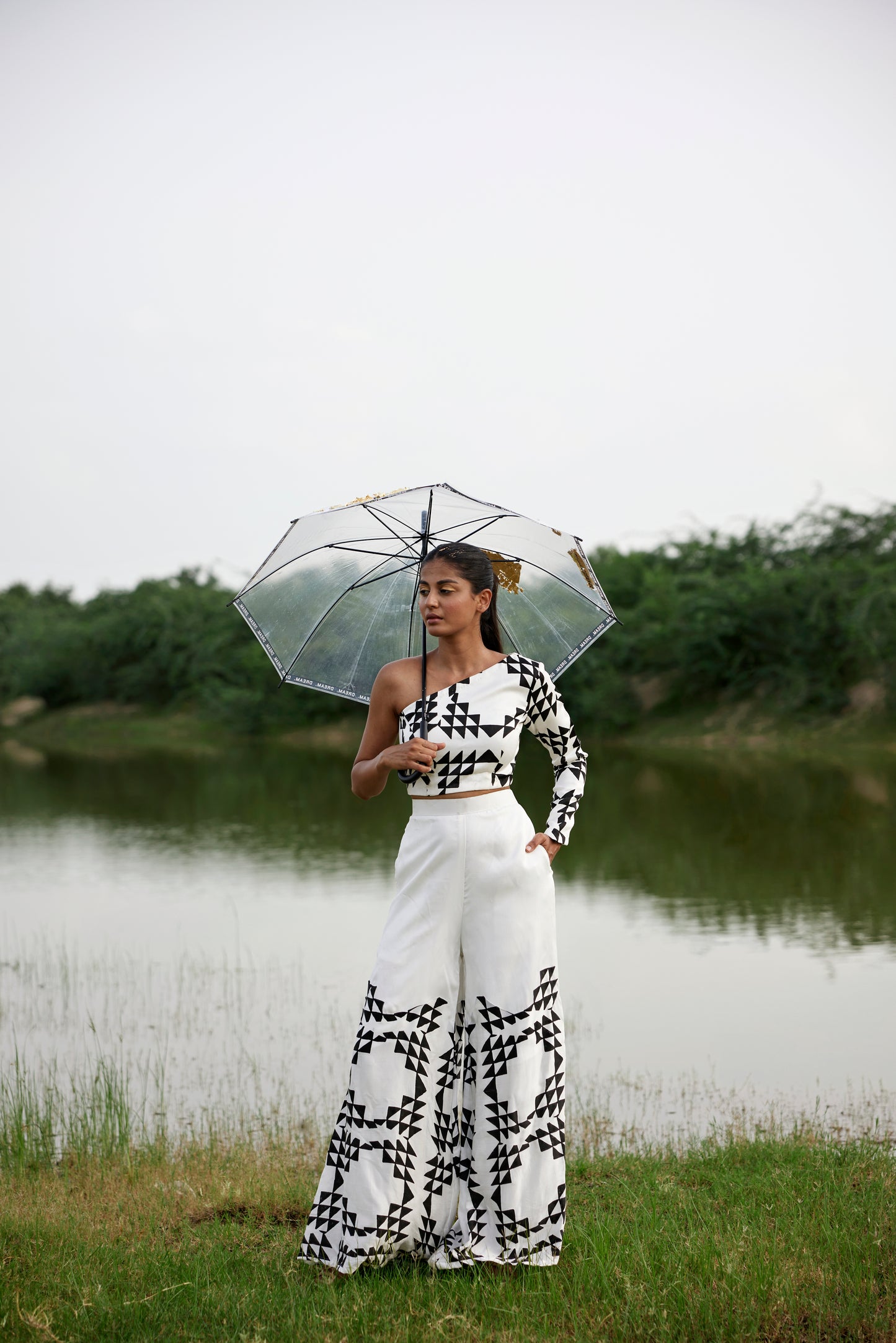 One-shoulder hand-blocked blouse paired with pants for women