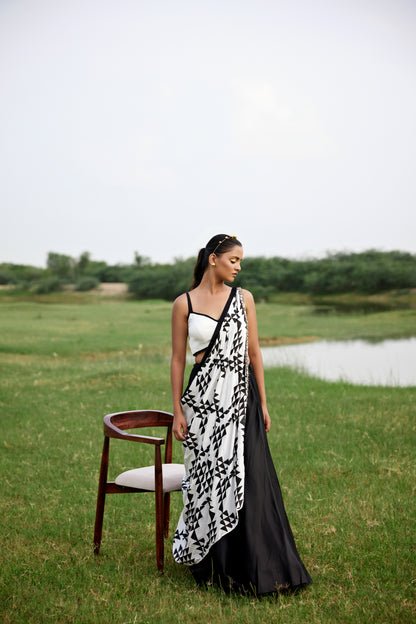 Black lehenga set paired with drape dupatta and chunky embroidery border for women