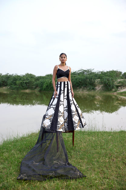 Black hand block patched heavily embroiderd lehenga set paired with organza dupatta and blouse for women