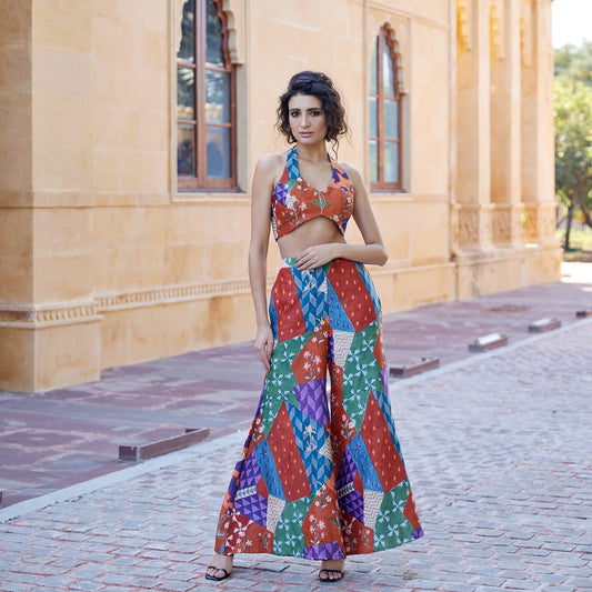 Burnt orange satin palazzo pant set paired with a highlighted blouse & organza jacket for women