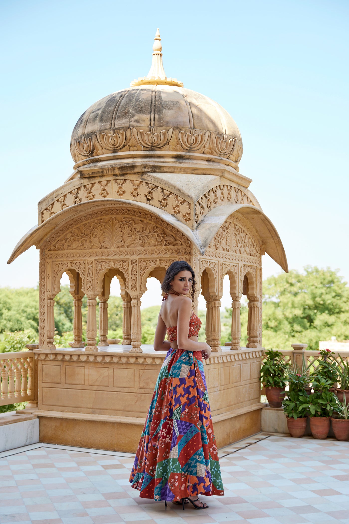 Burnt orange satin hand block lehenga set paired with a highlighted blouse for women