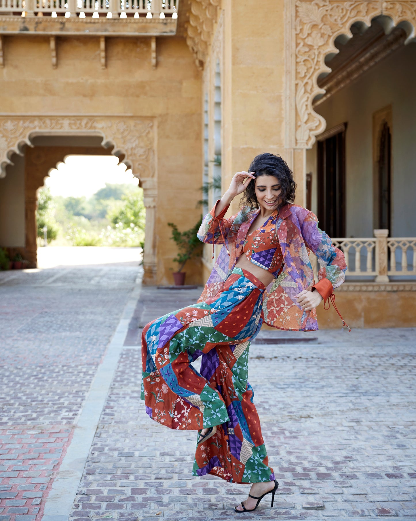 Burnt orange satin palazzo pant set paired with a highlighted blouse & organza jacket for women