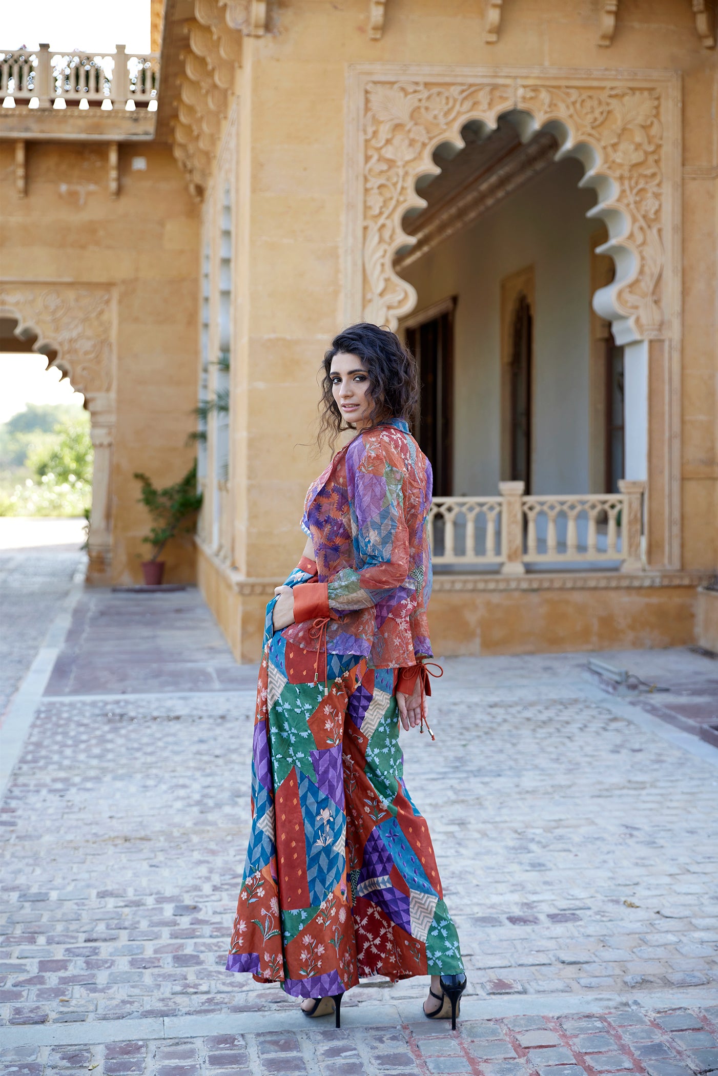 Burnt orange satin palazzo pant set paired with a highlighted blouse & organza jacket for women