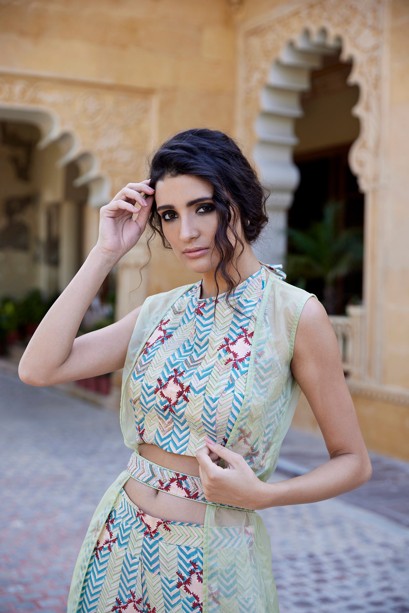 Pistachio hand-block printed palazzo pant set paired with a highlighted blouse, belt, and organza jacket for women