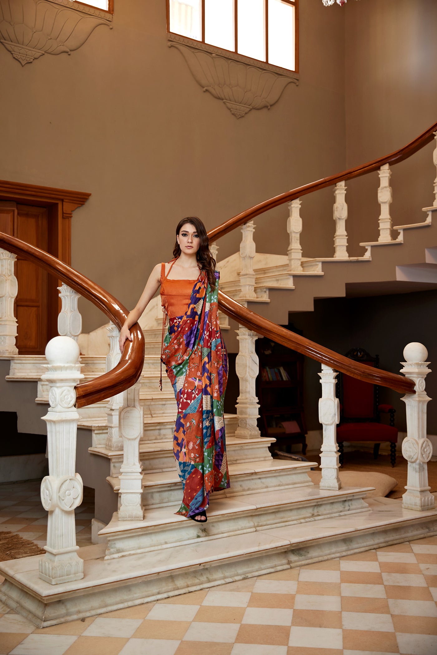 Burnt orange satin drape saree paired with corset for women