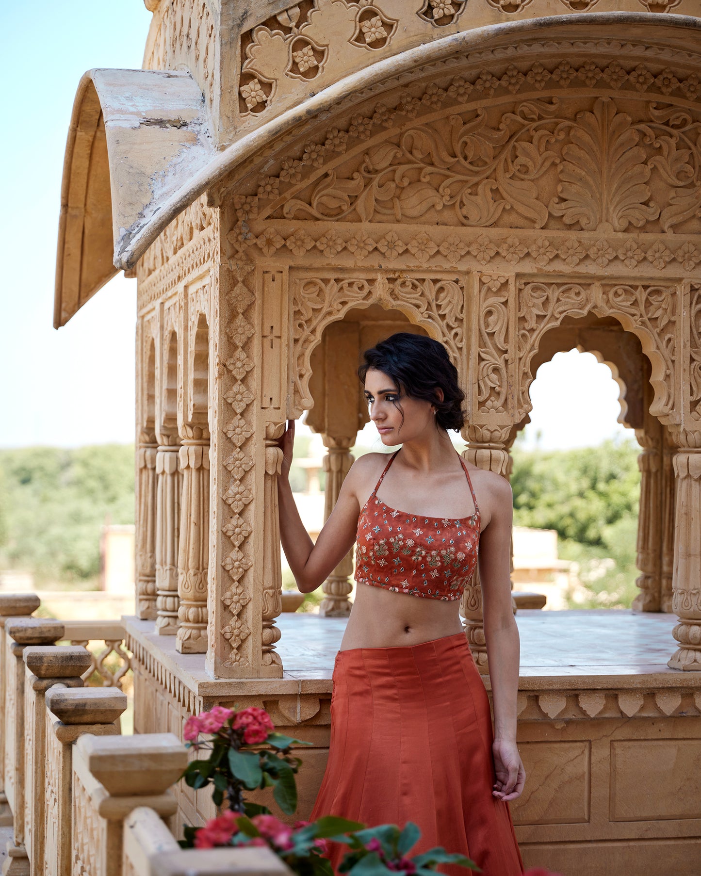 Burnt orange lehenga set with patched hand block border with an highlighted blouse for women