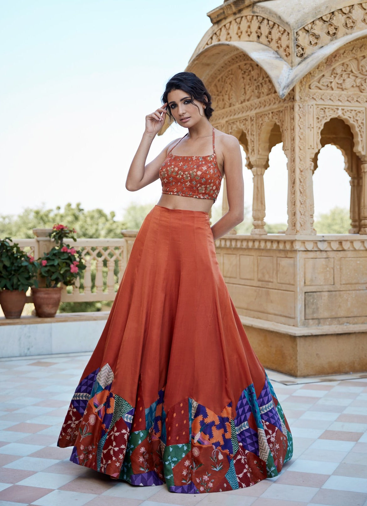 Burnt orange lehenga set with patched hand block border with an highlighted blouse for women